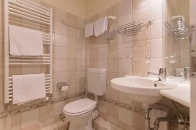 Ein Badezimmer in der Unterkunft Ferienhaussiedlung Strandperlen Küstenhof 3b (Typ V)
