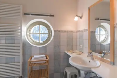 Ein Badezimmer in der Unterkunft Ferienhaussiedlung Strandperlen Küstenhof 4a (Typ IX)