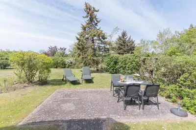 Ein Garten an der Unterkunft Ferienhaussiedlung Strandperlen Küstenhof 4a (Typ IX)