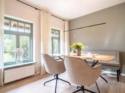 Ein Sitzbereich in der Unterkunft Ferienhaussiedlung Strandperlen Küstenhof 4b (Typ IX)