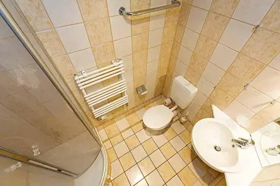 Ein Badezimmer in der Unterkunft Ferienhaussiedlung Strandperlen Küstenhof 1b (Typ V)