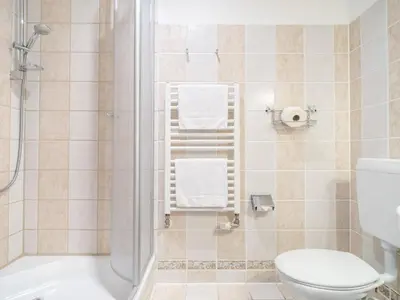 Ein Badezimmer in der Unterkunft Ferienhaussiedlung Strandperlen Küstenhof 2b (Typ V)