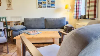 Ein Sitzbereich in der Unterkunft Ferienhaussiedlung Strandperlen Küstenhof 2b (Typ V)
