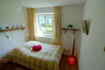 Ein Bett oder Betten in einem Zimmer der Unterkunft BIRKENHOF Whg. BH-41