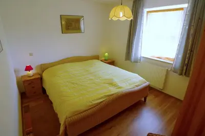 Ein Bett oder Betten in einem Zimmer der Unterkunft BIRKENHOF Whg. BH-41