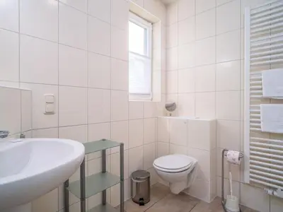 Ein Badezimmer in der Unterkunft Haus MEERESRAUSCHEN Whg. MR-1