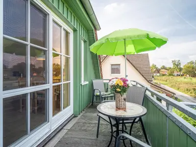 Ein Balkon oder eine Terrasse in der Unterkunft Haus MEERESRAUSCHEN Whg. MR-2