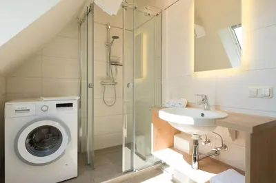 Ein Badezimmer in der Unterkunft Ferienhaussiedlung Strandperlen Buchenhof 6a (Typ III)