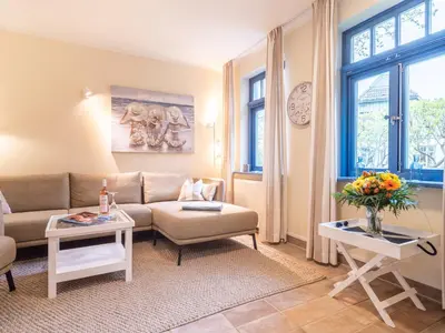 Ein Sitzbereich in der Unterkunft Ferienhaussiedlung Strandperlen Sanddornhof 6b (Typ VII)