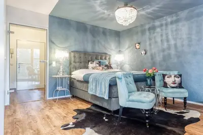 Ein Bett oder Betten in einem Zimmer der Unterkunft Ostseeresidenz - App 03 Strandsalon