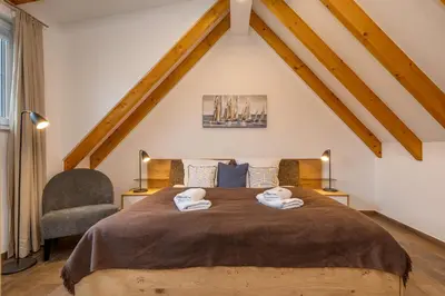 Ein Bett oder Betten in einem Zimmer der Unterkunft Suite Strandluft