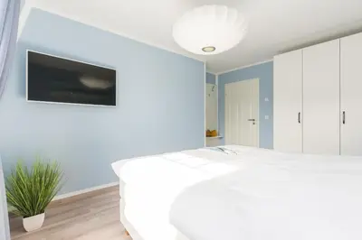 Ein Bett oder Betten in einem Zimmer der Unterkunft Bahnhofstr. 31 Wg.9 