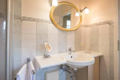 Ein Badezimmer in der Unterkunft Ferienhaussiedlung Strandperlen Sanddornhof 5a (Typ IV)