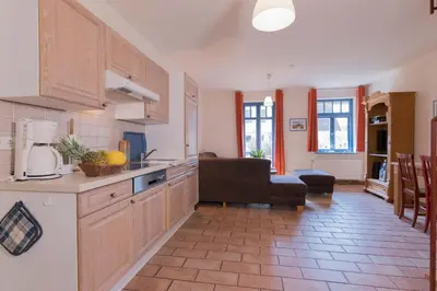 Küche/Küchenzeile in der Unterkunft Ferienhaussiedlung Strandperlen Küstenhof 3c (Typ V)