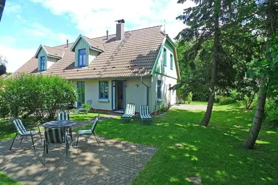 Ein Garten an der Unterkunft Ferienhaussiedlung Strandperlen Küstenhof 3d (Typ IV)