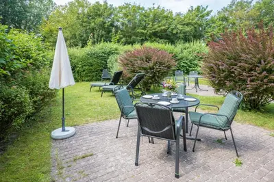 Ein Garten an der Unterkunft Ferienhaussiedlung Strandperlen Küstenhof 1c (Typ V)