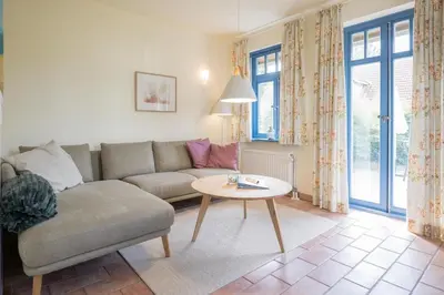 Ein Sitzbereich in der Unterkunft Ferienhaussiedlung Strandperlen Küstenhof 3a (Typ IV)