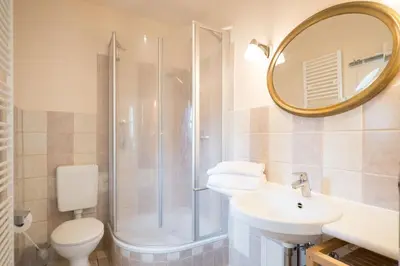 Ein Badezimmer in der Unterkunft Ferienhaussiedlung Strandperlen Küstenhof 3a (Typ IV)