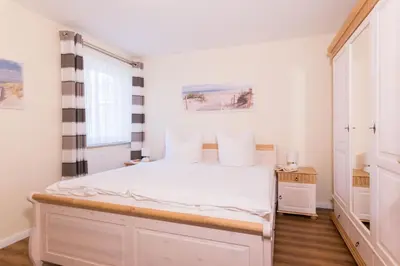 Ein Bett oder Betten in einem Zimmer der Unterkunft ALTES WASSERWERK Whg. AW-06