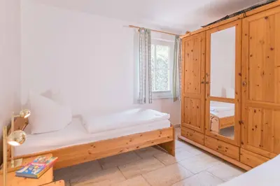 Ein Bett oder Betten in einem Zimmer der Unterkunft Haus WINDFLÜCHTER Whg. LF 5.1