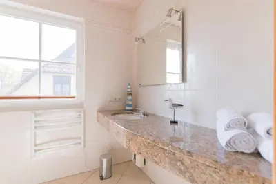 Ein Badezimmer in der Unterkunft Haus WINDFLÜCHTER Whg. LF 5.2