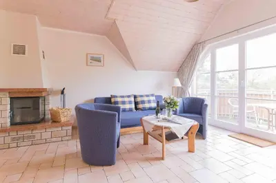 Ein Sitzbereich in der Unterkunft Haus WINDFLÜCHTER Whg. LF 5.2