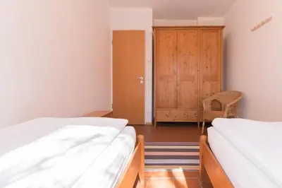 Ein Bett oder Betten in einem Zimmer der Unterkunft Landhaus DADDELDU Whg. V-D1 (vorne)