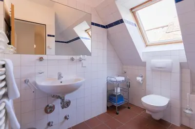 Ein Badezimmer in der Unterkunft Landhaus DADDELDU Whg. V-D1 (vorne)
