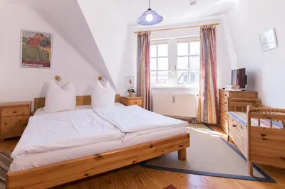 Ein Bett oder Betten in einem Zimmer der Unterkunft KOJE