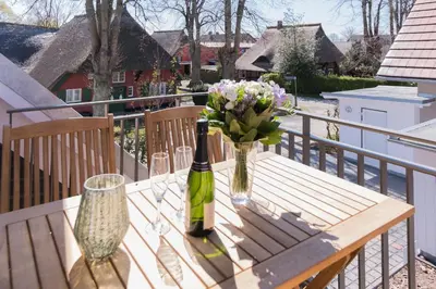 Ein Balkon oder eine Terrasse in der Unterkunft Middenmang - Am Fischlandhaus