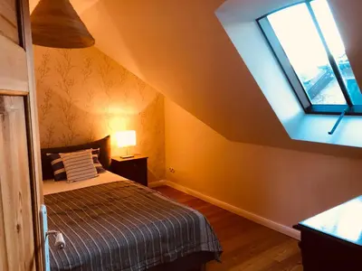 Ein Bett oder Betten in einem Zimmer der Unterkunft Katjas Kate Mansarde