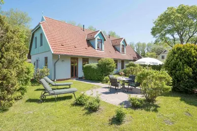 Ein Garten an der Unterkunft Ferienhaussiedlung Strandperlen Buchenhof 4a (Typ IV)