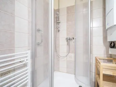 Ein Badezimmer in der Unterkunft Ferienhaussiedlung Strandperlen Buchenhof 4c (Typ V)