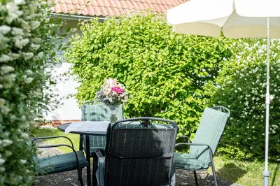 Ein Garten an der Unterkunft Ferienhaussiedlung Strandperlen Buchenhof 4c (Typ V)