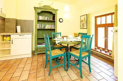 Küche/Küchenzeile in der Unterkunft Ferienhaussiedlung Strandperlen Buchenhof 5b (Typ V)
