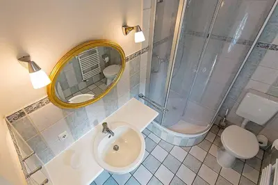 Ein Badezimmer in der Unterkunft Ferienhaussiedlung Strandperlen Weidenhof 8d (Typ IV)