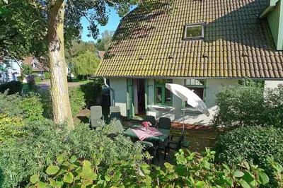 Ein Garten an der Unterkunft Ferienhaussiedlung Strandperlen Weidenhof 3a (Typ VIII)