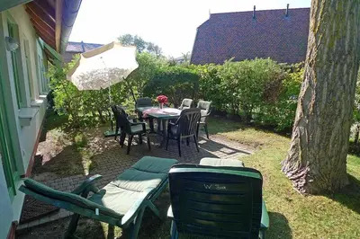 Ein Garten an der Unterkunft Ferienhaussiedlung Strandperlen Weidenhof 3a (Typ VIII)