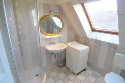 Ein Badezimmer in der Unterkunft Ferienhaussiedlung Strandperlen Weidenhof 3a (Typ VIII)