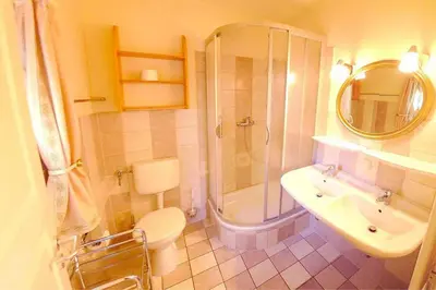 Ein Badezimmer in der Unterkunft Ferienhaussiedlung Strandperlen Weidenhof 3a (Typ VIII)
