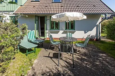 Ein Garten an der Unterkunft Ferienhaussiedlung Strandperlen Weidenhof 3d (Typ I)