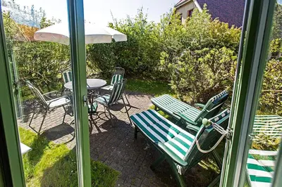 Ein Garten an der Unterkunft Ferienhaussiedlung Strandperlen Weidenhof 3d (Typ I)