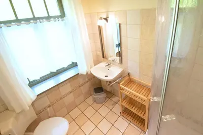 Ein Badezimmer in der Unterkunft Ferienhaussiedlung Strandperlen Sanddornhof 7b (Typ VI)