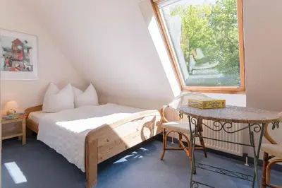 Ein Bett oder Betten in einem Zimmer der Unterkunft Ferienhaussiedlung Strandperlen Sanddornhof 7c (Typ II)