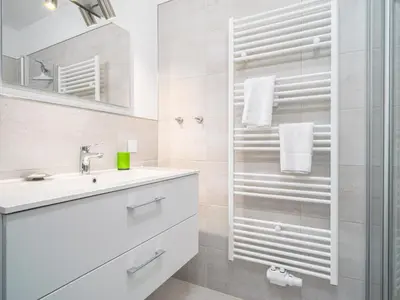 Ein Badezimmer in der Unterkunft Ferienhaussiedlung Strandperlen Sanddornhof 7c (Typ II)