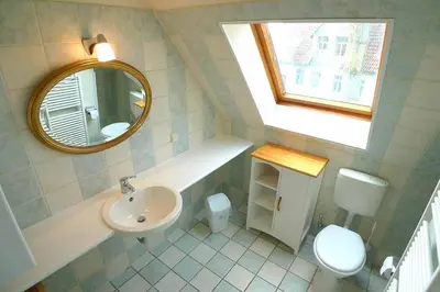 Ein Badezimmer in der Unterkunft Ferienhaussiedlung Strandperlen Sanddornhof 2a (Typ VIII)