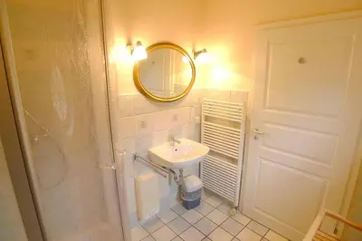 Ein Badezimmer in der Unterkunft Ferienhaussiedlung Strandperlen Sanddornhof 2a (Typ VIII)