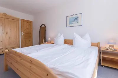 Ein Bett oder Betten in einem Zimmer der Unterkunft Haus zum Strand HAUS ZUM STRAND Whg 3.3