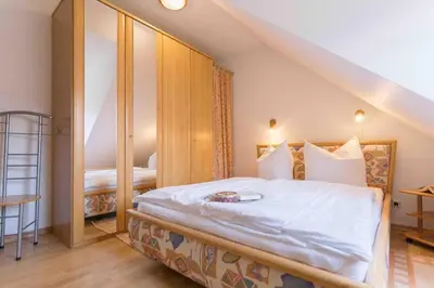 Ein Bett oder Betten in einem Zimmer der Unterkunft Haus zum Strand HAUS ZUM STRAND Whg 3.4