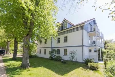 Ein Garten an der Unterkunft Haus zum Strand HAUS ZUM STRAND Whg 3.4